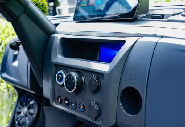 Carbon fiber-style dash on EPIC e40FX with modern controls and digital display screen